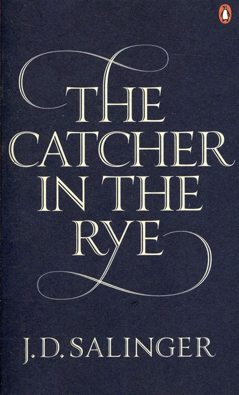 Blue book cover with white cursive text reading "The Catcher in the Rye", J.D. Salinger.