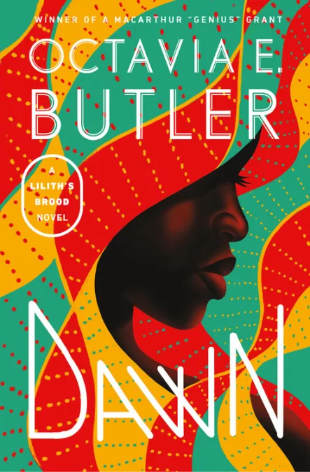 Cover image of Dawn, with geometric patterns in red, yellow, and green, and the lower part of a woman's face visible on top.